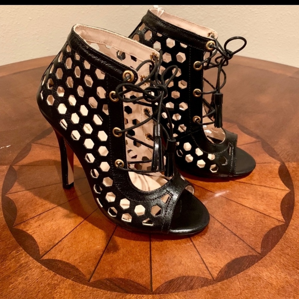 Christian Milano genuine leather.  It's a beauty.